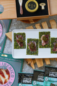 Seaweed Snacks, caviar and ibercio ham on a plate
